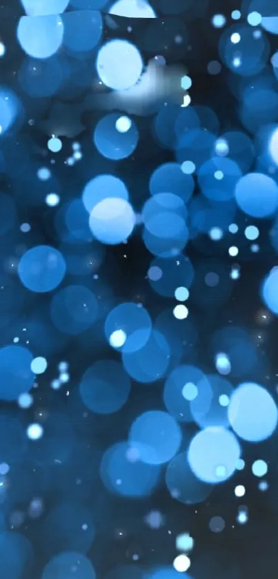 Blue bokeh light wallpaper with abstract glowing circles for mobile background.