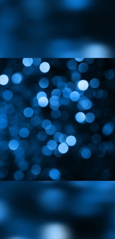 Blue bokeh wallpaper with out-of-focus lights creating a calming effect.