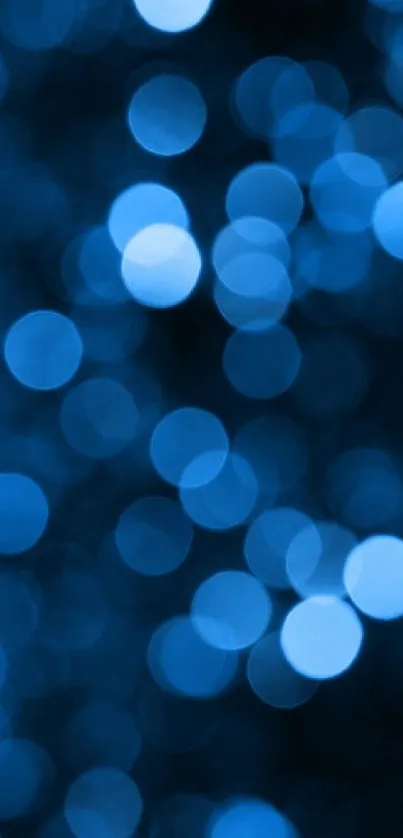 A serene blue bokeh wallpaper for mobile screens.