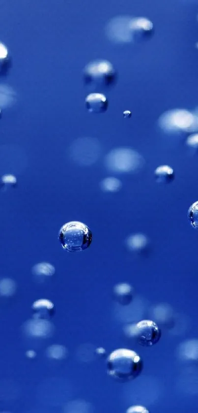 Blue mobile wallpaper featuring floating water bubbles.