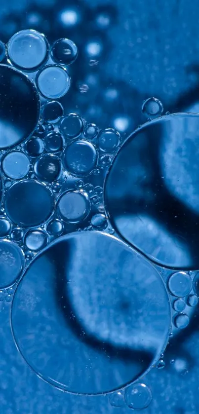 Abstract blue bubbles arranged in a geometric pattern on a textured background.