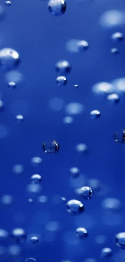 Blue bubbles in water creating an abstract, soothing mobile wallpaper.