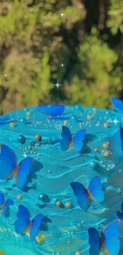 Vibrant blue cake with butterfly decorations on a green background.