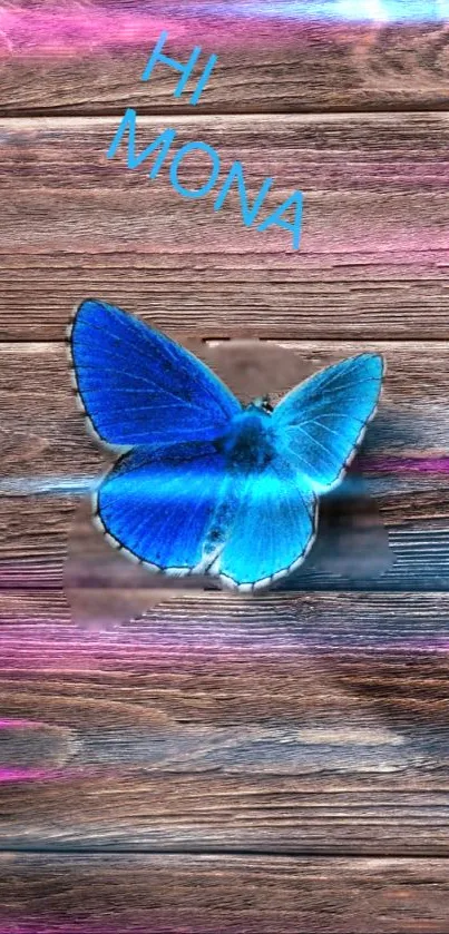 Blue butterfly rests on wood with pink hues.