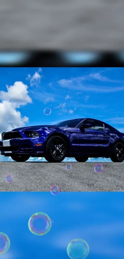 Sleek blue car under a vibrant blue sky with clouds and bubbles.