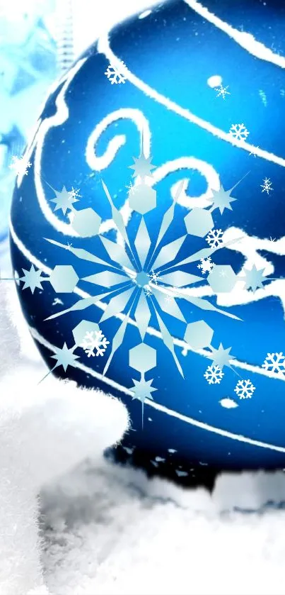 Blue Christmas ornament with snowflakes and festive winter theme.