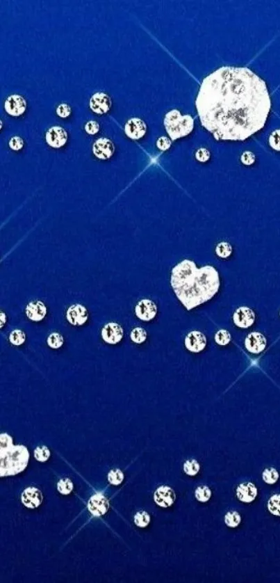 Blue wallpaper with sparkling crystals and heart patterns.