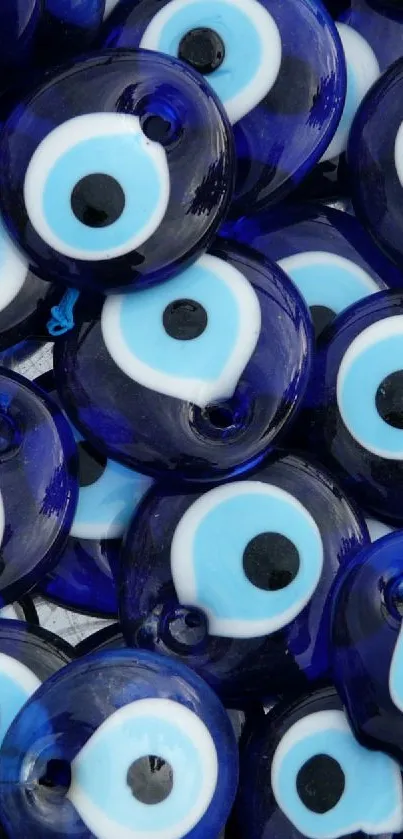 Blue evil eye pattern mobile wallpaper with protective charm theme.