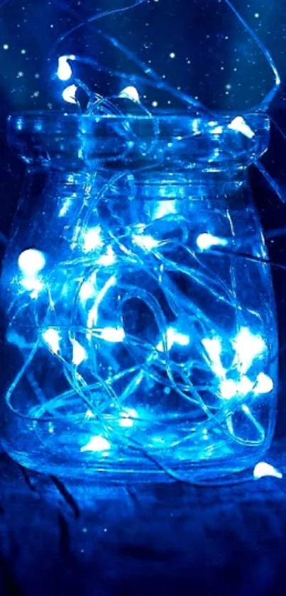 Mobile wallpaper of glowing blue fairy lights in a glass jar.