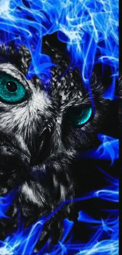 Owl with vibrant blue flames and teal eyes on a dark background.