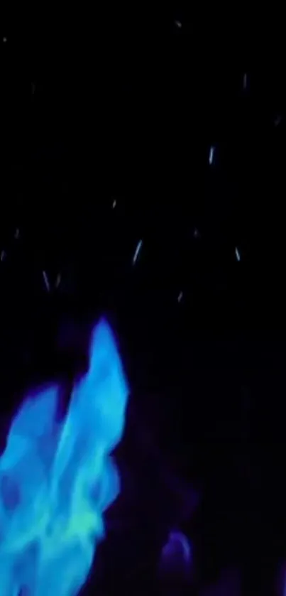 Mesmerizing blue flame against dark background.