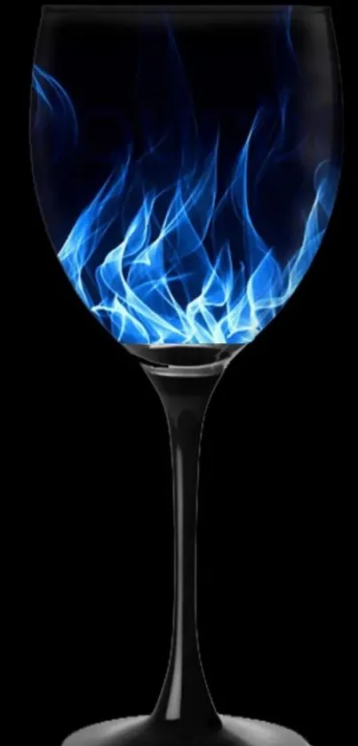 A wine glass with blue flames inside on a black background.