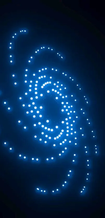 Blue galaxy spiral with starry dots on a dark background wallpaper.