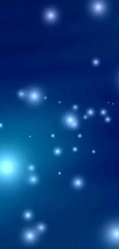 Blue galaxy wallpaper with shimmering stars and cosmic ambiance.