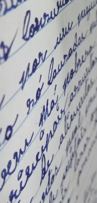 Blue handwritten cursive text on lined paper wallpaper.