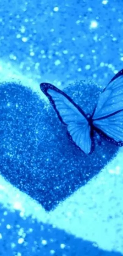 Glittery blue heart with butterfly design.