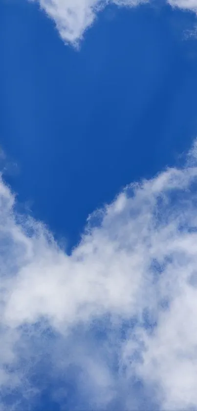 Heart-shaped clouds against a blue sky in a mobile wallpaper.