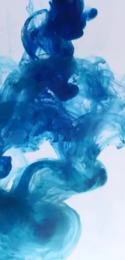 A swirling blue ink cloud creates an abstract wallpaper design.