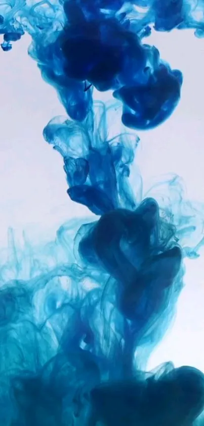 Flowing blue ink in water creating an abstract and artistic design.