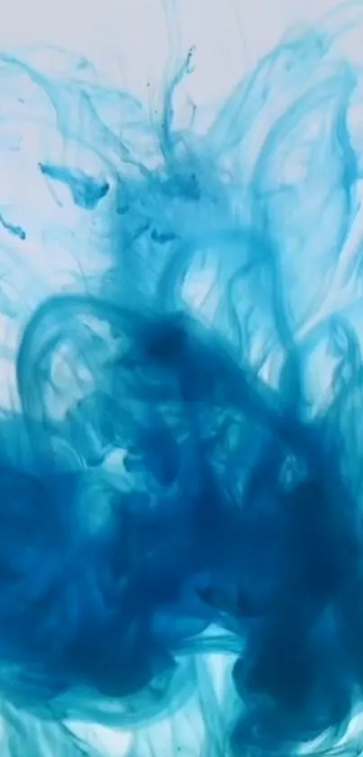 Abstract blue ink swirls in water, creating a calming visual.