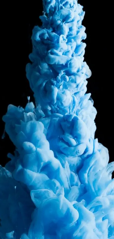 Blue ink swirling in fluid artistic design.