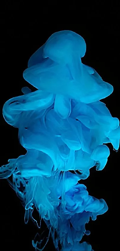 Mesmerizing blue ink swirl on black background.