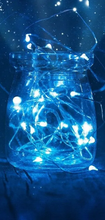 Glass jar with glowing blue fairy lights against a starry background.