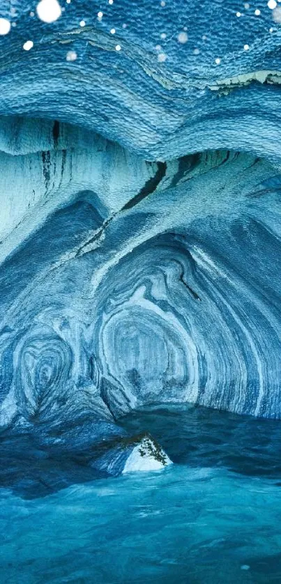 A serene blue marble cave with rippling water effect in the foreground.
