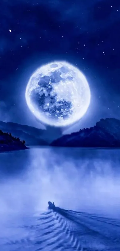 Full moon reflecting over a tranquil blue lake at night.