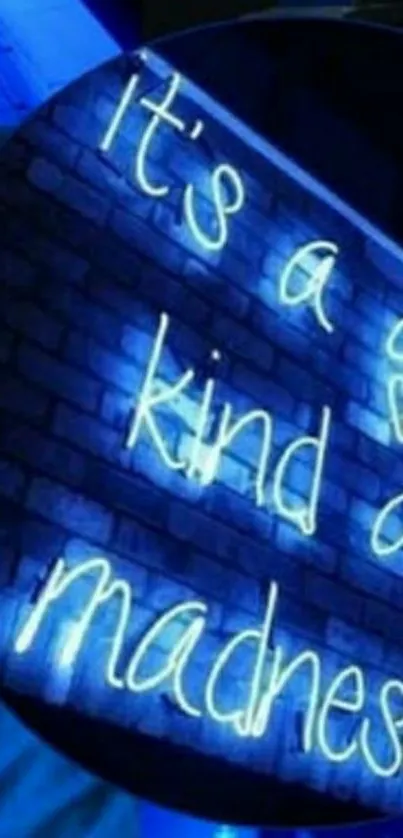 Neon blue text on a brick wall wallpaper.