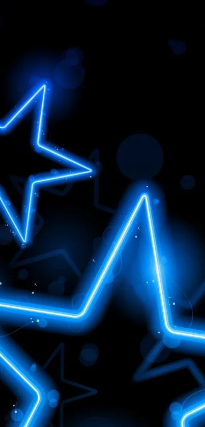 Vibrant neon blue stars on dark background wallpaper.