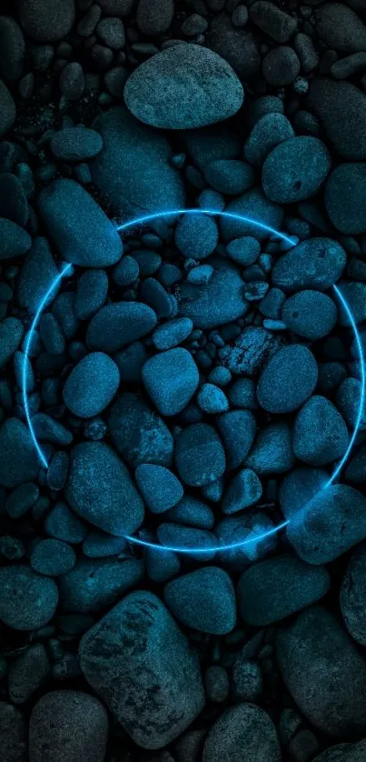 Blue neon circle on dark stone pebbles wallpaper.