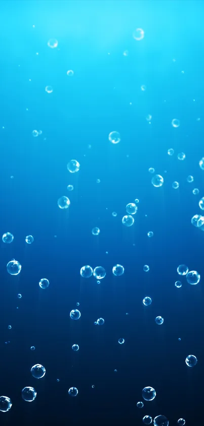 Serene blue ocean wallpaper with rising bubbles.