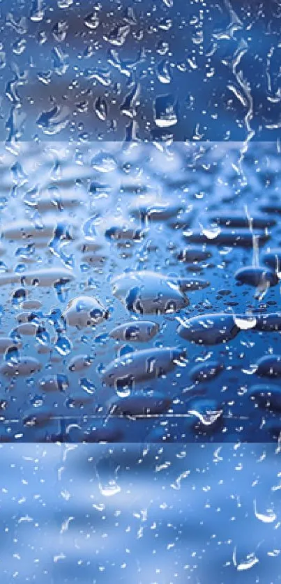 Blue raindrop wallpaper with water droplets on vivid surface.