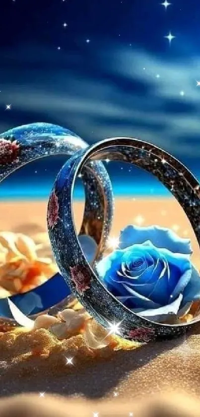 Blue rose and rings on sandy beach under starry night sky.