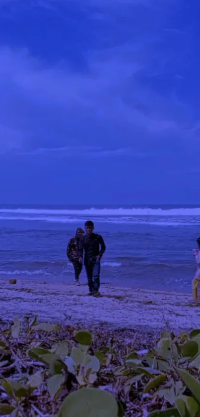 Beach walk under a vibrant blue sky with waves and greenery.