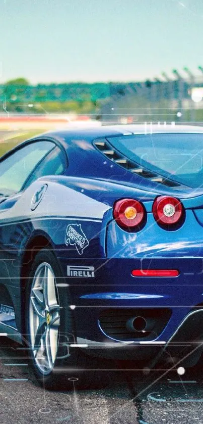 Blue sports car on a race track in dynamic perspective.