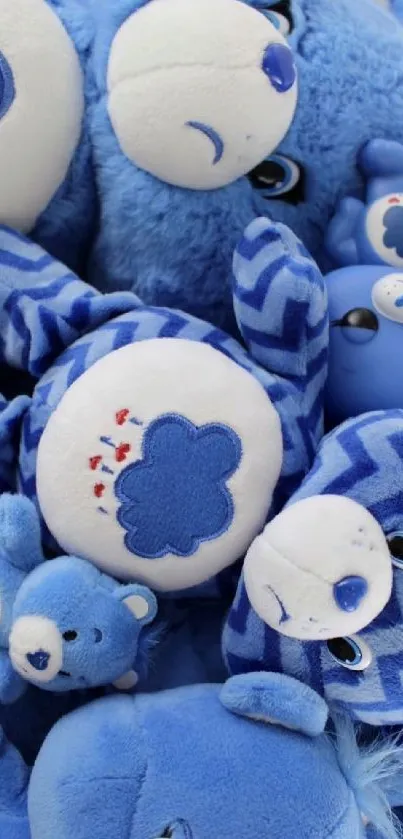 Blue teddy bear wallpaper with plush toys.