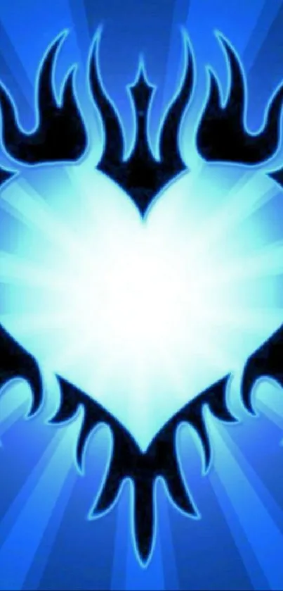 A vibrant blue tribal heart wallpaper with bold tribal design on a phone screen.