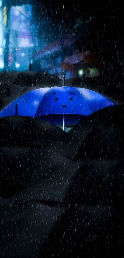 Blue umbrella stands out in a rainy night scene.