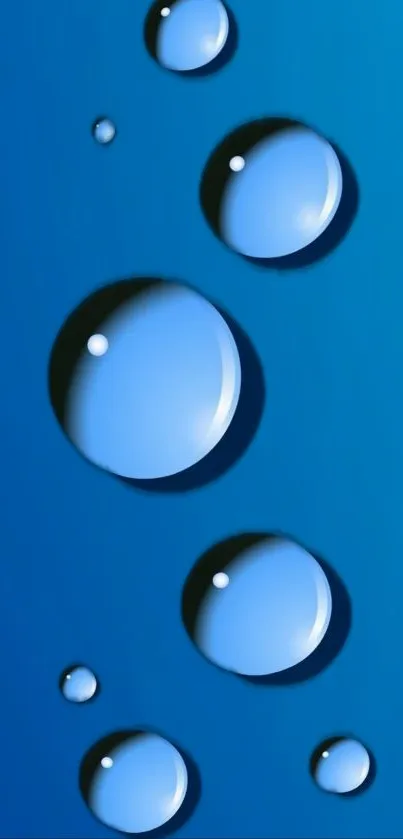 Glossy blue water droplets on a bright wallpaper background.