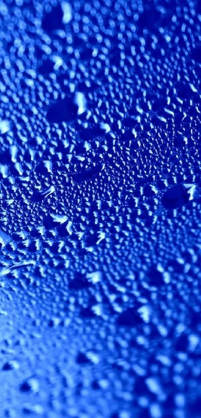 Blue wallpaper with water droplets texture for mobile.