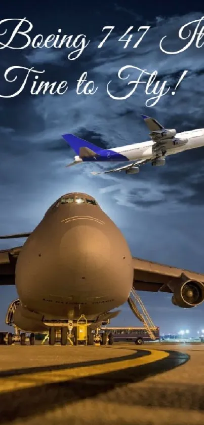 Boeing 747 parked at night with another plane flying above.