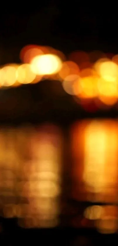 Bokeh effect with golden lights on a dark background.