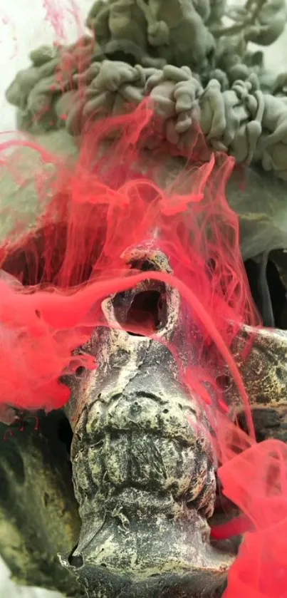 Artistic skull with red smoke on your phone wallpaper.