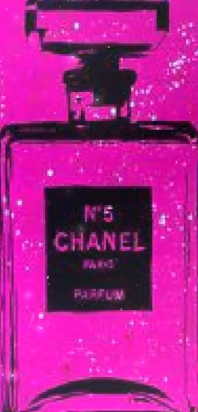 Chanel No 5 perfume bottle on vibrant pink background.