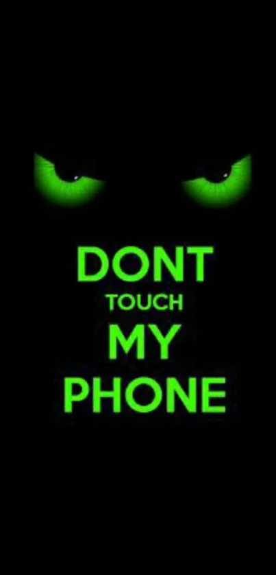 Green eyes with 'Don't Touch My Phone' message on black background.