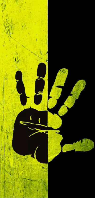 Yellow and black handprint wallpaper with a bold, textured design.