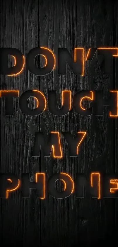 Bold 'Don't Touch My Phone' wallpaper with dark background and orange accents.