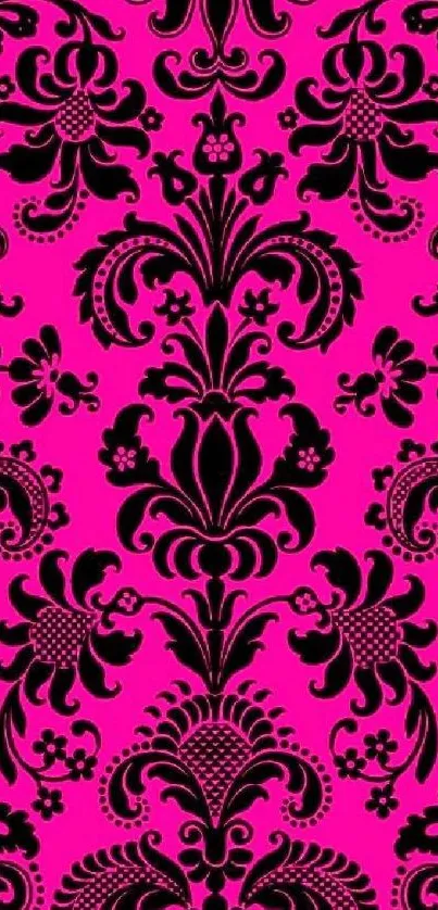 Mobile wallpaper featuring bold pink Victorian damask pattern.